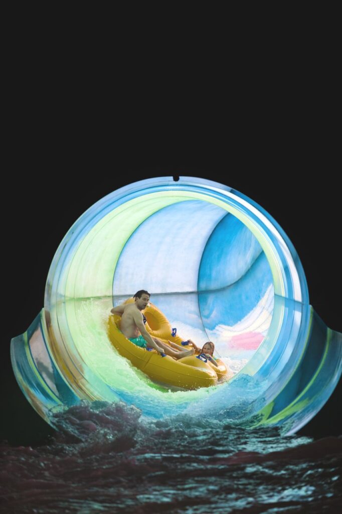 A family on one of the water slides at Lalandia, which is one of the many attractions in LEGOLAND® Billund Resort.